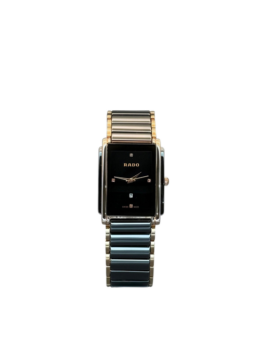 ACCHA TIME rectangular two-tone watch with a black dial, diamond markers, and ceramic and gold-tone stainless links.